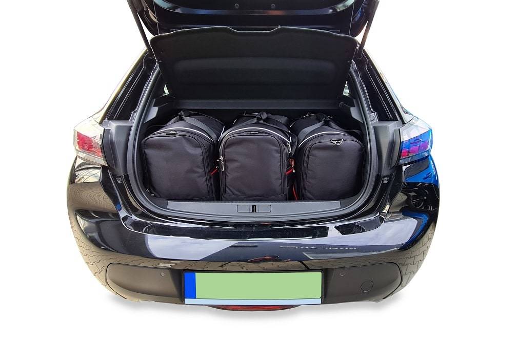 Jak otwiera się bagażnik Peugeot e-208 od wewnątrz ?